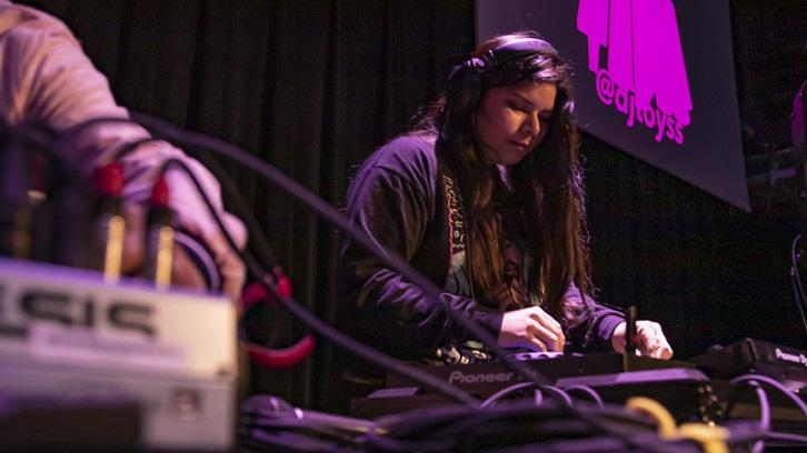 A student DJ spins tunes during the DJ showcase.